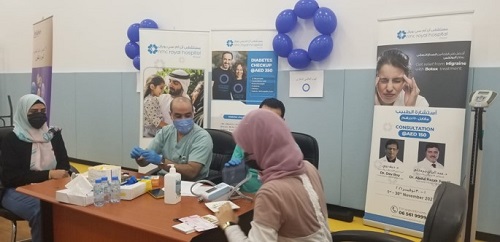 nmc conducted health screening sharjah city for humanitarian services 003