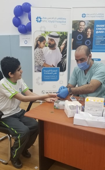 nmc conducted health screening sharjah city for humanitarian services 004